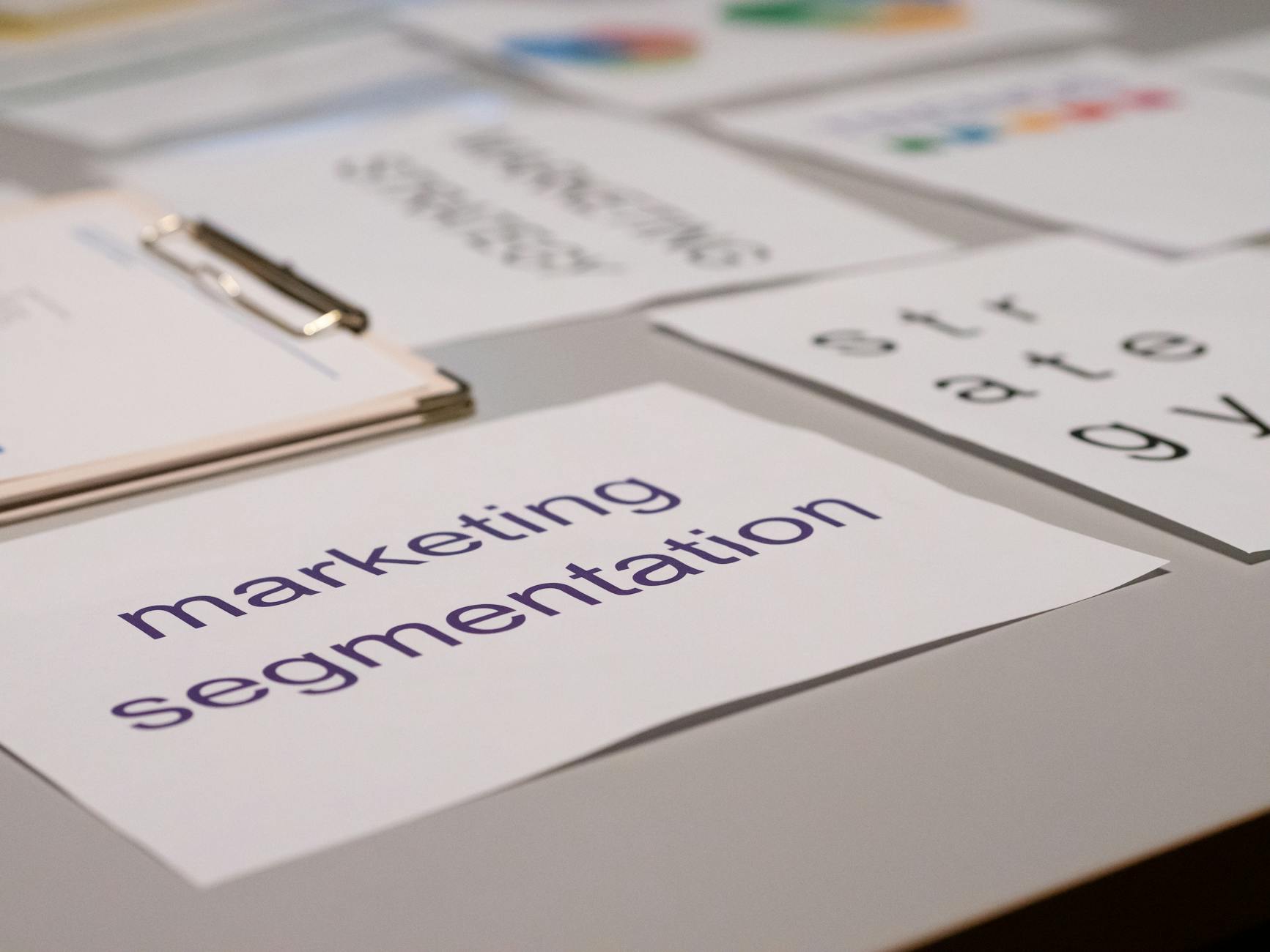 Marketing strategy documents spread across a desk